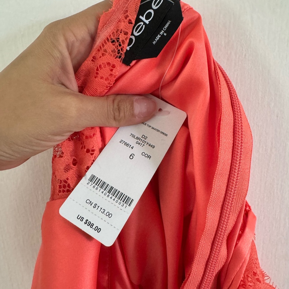 Orange BEBE dress size 6!